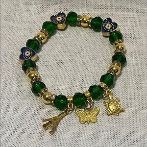 Elegant Green and Gold Charm Bracelet